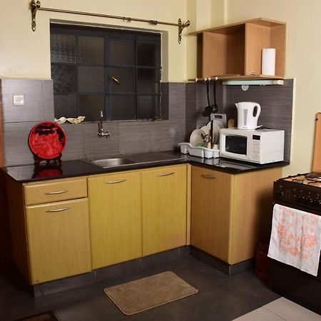 Minimalistic Studio Apartments Найроби Экстерьер фото